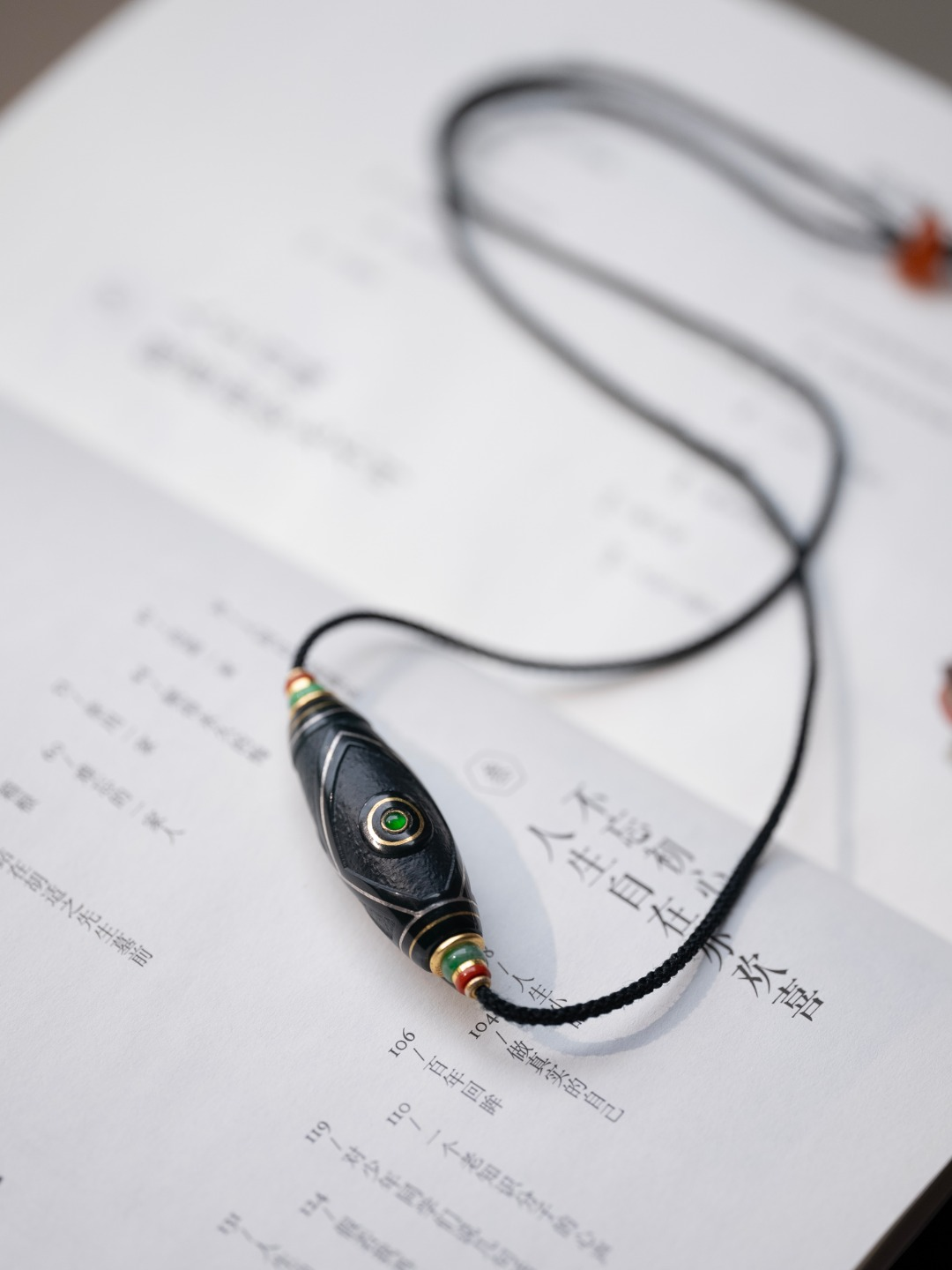 Two-Eyed Dzi Bead Pendant